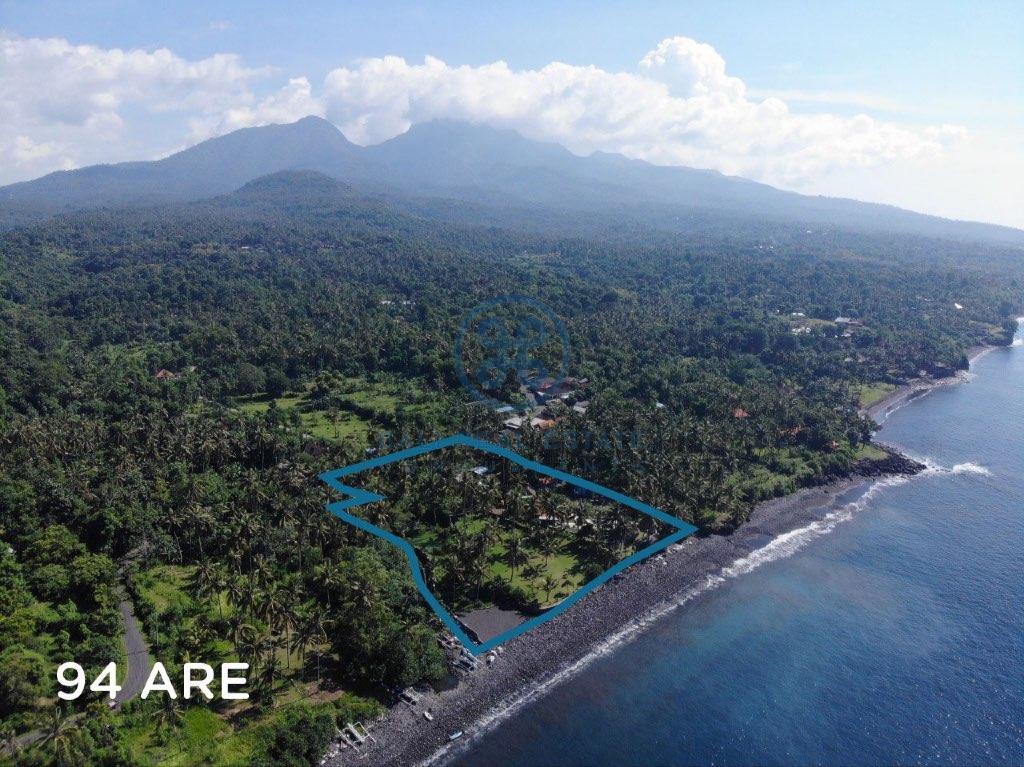 are land absolute beachfront in seraya for sale