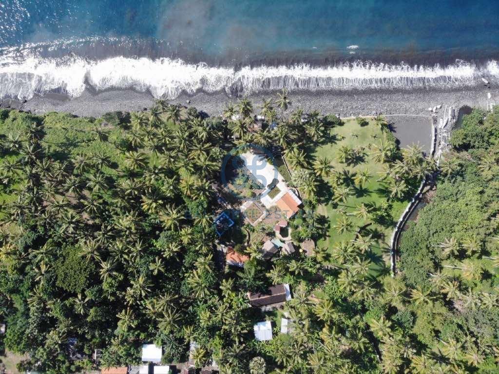 are land absolute beachfront in seraya for sale